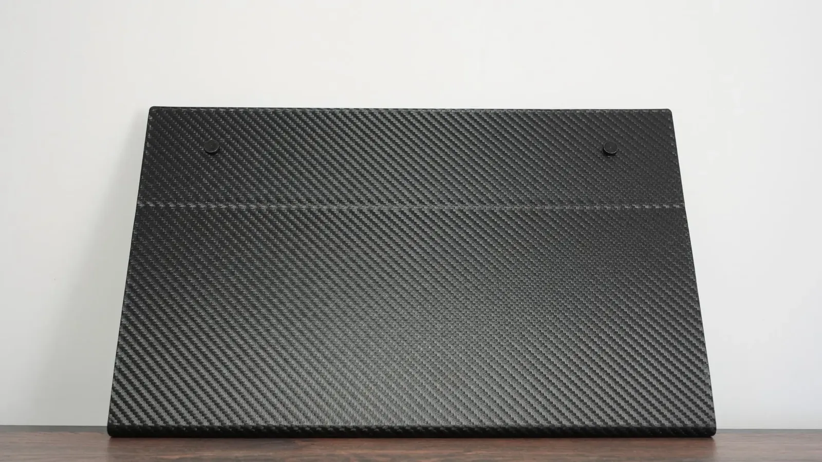 Portable monitor folded flat inside its cover